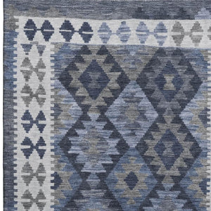 HomeRoots 9' x 12' Navy Blue and Ivory Tribal Area Rug - Washable, UV Protected, Durable for High-Traffic Spaces 707946