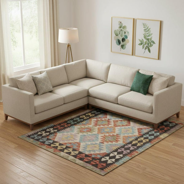 HomeRoots 10' X 14' Tribal Washable Area Rug in Rust, Blue, and Beige - UV Protected, Stain Resistant, Durable Design 707959
