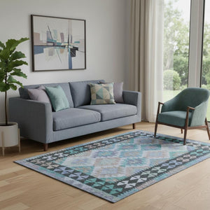 HomeRoots 8' Teal and Charcoal Tribal Round Rug – Washable, UV-Protected, Durable for Kids & Pets, Stylish Decor 707974