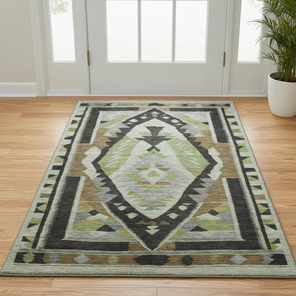 HomeRoots 5' X 8' Tribal Area Rug in Brown, Green & Charcoal - Washable, UV-Protected & Pet-Friendly Design 707985