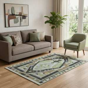 HomeRoots 8' Brown Green Charcoal Tribal Round Rug - Washable, UV Protected, Durable for High-Traffic Spaces 707986