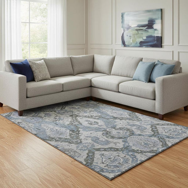 HomeRoots 9' X 12' Stylish Gray and Blue Ikat Washable Area Rug with UV Protection for Modern Spaces 708174
