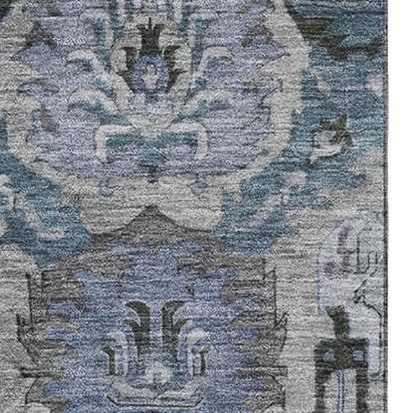 HomeRoots 9' X 12' Stylish Gray and Blue Ikat Washable Area Rug with UV Protection for Modern Spaces 708174