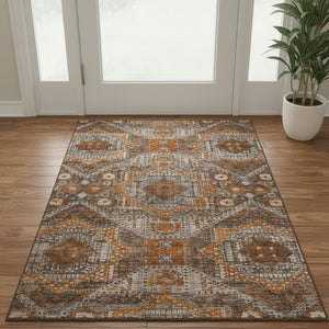 HomeRoots 5' X 8' Abstract Geometric Area Rug in Copper, Rust & Beige - Washable, UV-Protected, Non-Slip Design 708369