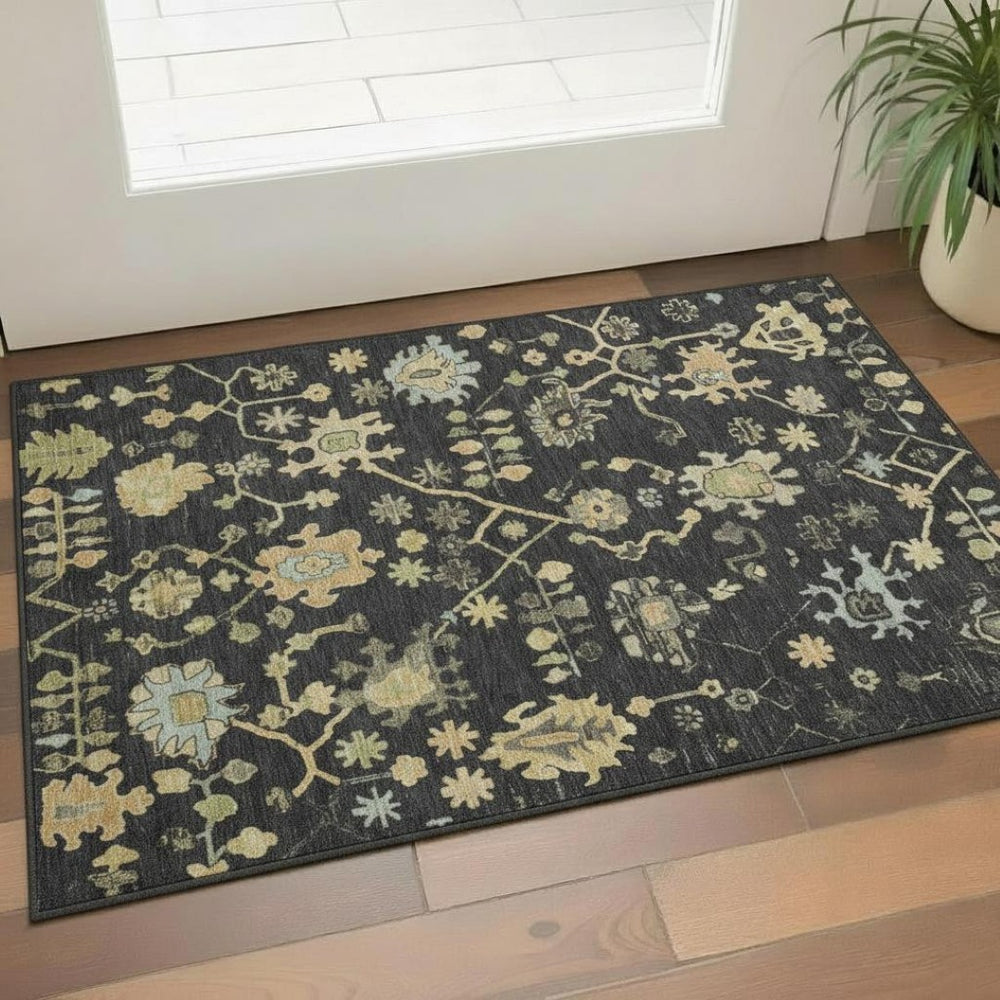 HomeRoots 5' X 8' Washable Black Gold and Blue Floral Area Rug with UV Protection for Kids and Pets' Spaces 708399