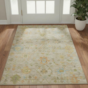 HomeRoots 5' X 8' Washable Khaki Gold & Blue Floral Area Rug with UV Protection for High-Traffic Spaces 708429