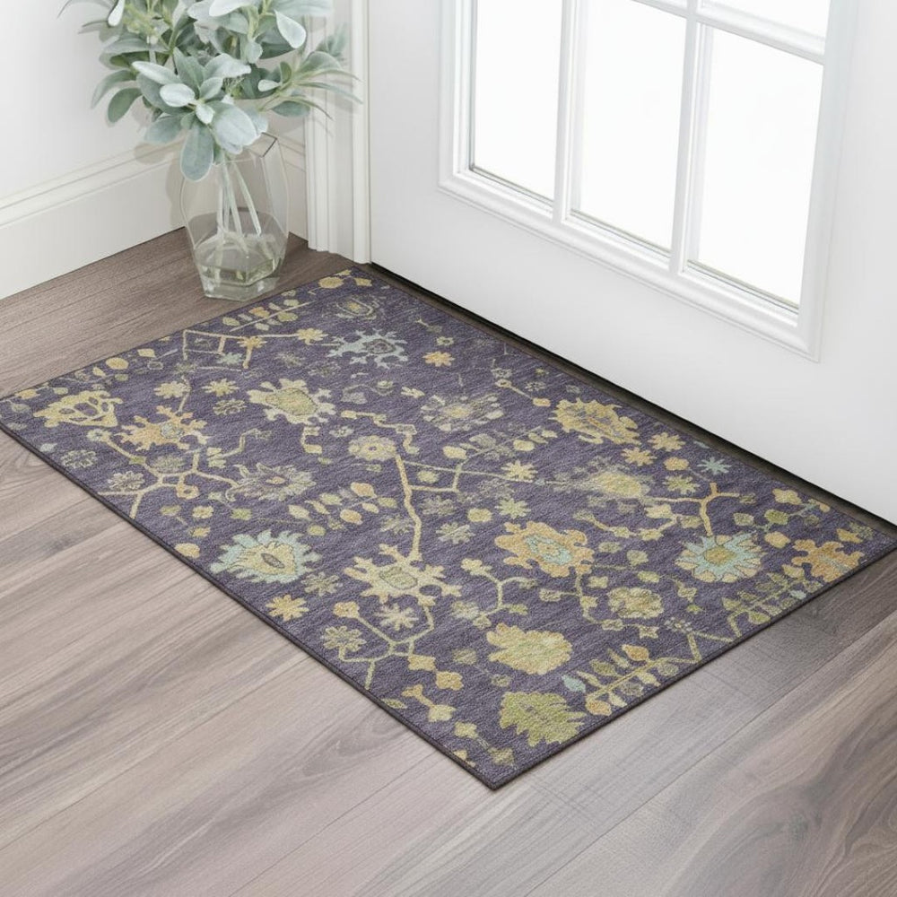 HomeRoots 5' X 8' Floral Area Rug in Purple, Gold & Blue - Washable, UV Protected & Stain-Resistant Design 708441