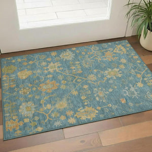 HomeRoots 5' Teal Gold and Blue Floral Washable Area Rug - UV Protected, Stain Resistant, Perfect for Families! 708453