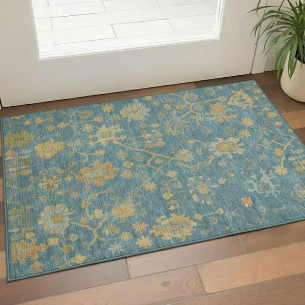 HomeRoots 5' Teal Gold and Blue Floral Washable Area Rug - UV Protected, Stain Resistant, Perfect for Families! 708453