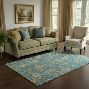 HomeRoots 8' Teal Gold and Blue Floral Round Rug - Washable, UV Protected, Stain Resistant for High Traffic Areas 708454