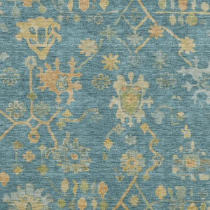 HomeRoots 10' Teal Gold and Blue Floral Area Rug – Washable, UV-Protected, Perfect for High-Traffic Spaces! 708457