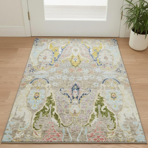 HomeRoots 5' X 8' Floral Washable Area Rug in Beige, Blue, and Gold - UV Protected, Non-Slip, Stain Resistant! 708471