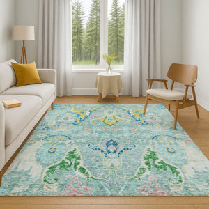 HomeRoots 5' X 8' Teal, Gold & Blue Floral Area Rug - Washable, UV Protected, Durable & Family-Friendly Decor 708507