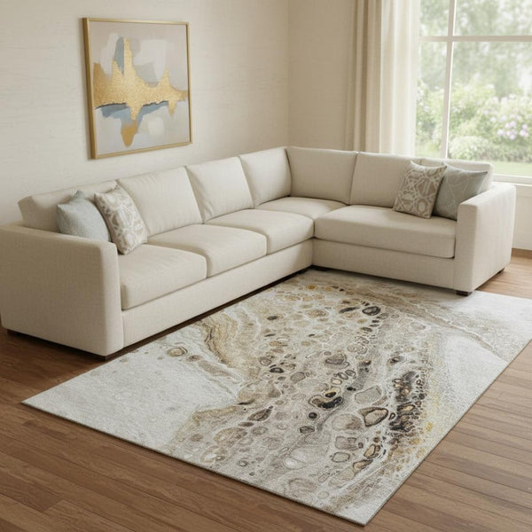 HomeRoots 9' X 12' Modern Abstract Washable Area Rug in Beige, Ivory & Taupe with UV Protection & Durability 708552