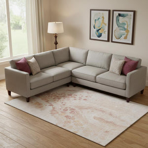 HomeRoots 10' X 14' Salmon and Ivory Abstract Washable Area Rug - Stain Resistant, UV Protected, Non-Slip! 708571