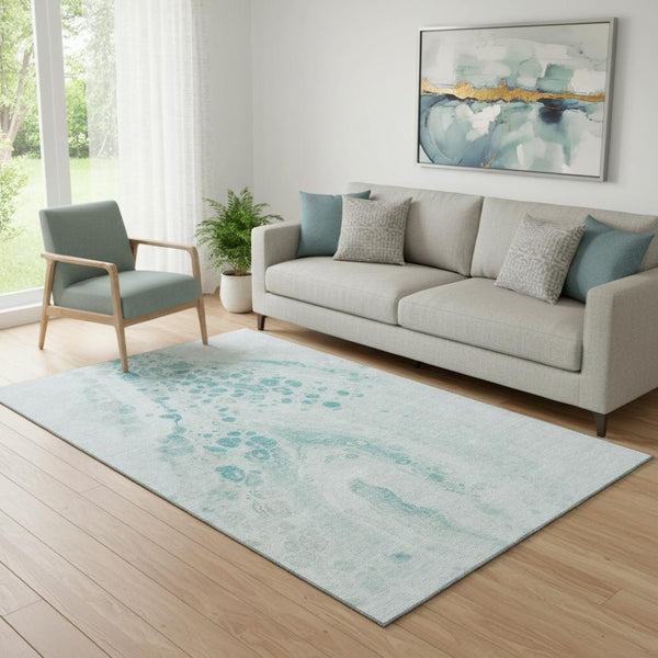 HomeRoots 8' Teal And Ivory Abstract Round Rug - Washable, UV-Protected, Durable for High-Traffic Areas 708574