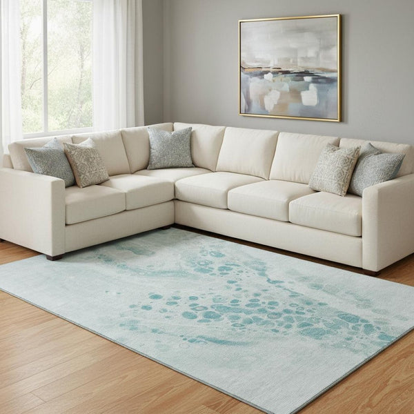 HomeRoots 9' X 12' Teal And Ivory Abstract Area Rug - Washable, UV-Protected, Durable for High-Traffic Spaces 708576
