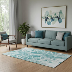 HomeRoots 8' Teal And Ivory Abstract Round Washable Rug with UV Protection for Modern Living Spaces 708604