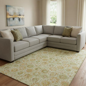 HomeRoots 9' X 12' Beige and Gold Floral Area Rug - Washable, Stain Resistant, UV Protected for Busy Homes 708648