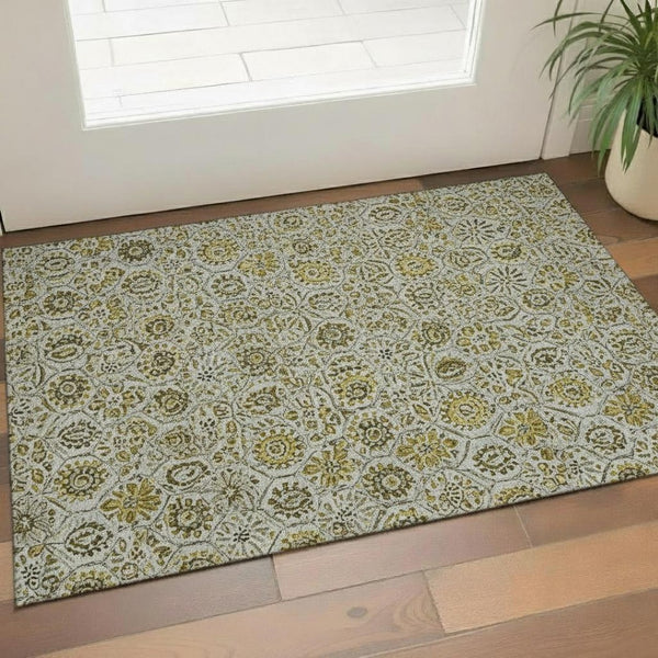 HomeRoots 5' X 8' Floral Washable Area Rug in Pewter Gold & Gray - Durable, Stain Resistant, UV Protected 708669