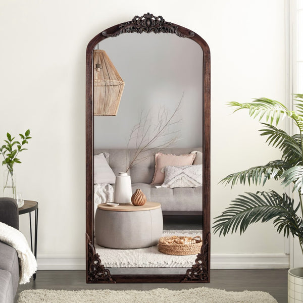 HomeRoots Black Wood Arch Freestanding Mirror - Elegant Ornate Framed Accent for Stylish Home Decor Spaces 708707