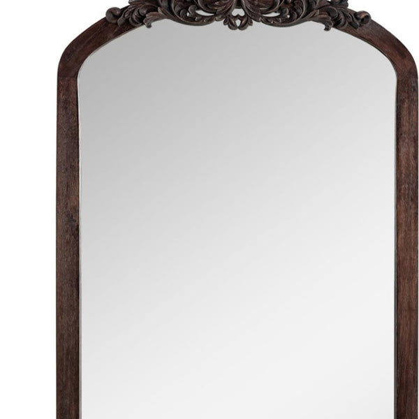 HomeRoots Black Wood Arch Freestanding Mirror - Elegant Ornate Framed Accent for Stylish Home Decor Spaces 708707