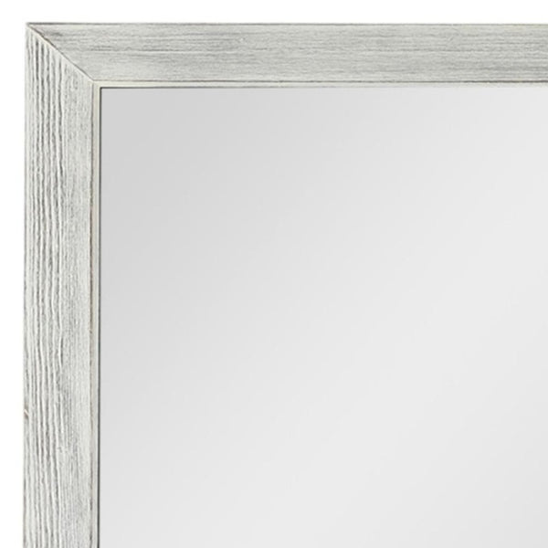 HomeRoots Brown Freestanding Ornate Accent Mirror with Carved Frame - Elevate Your Space with Style! 708715