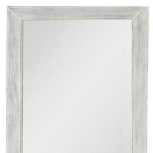 HomeRoots Brown Freestanding Ornate Accent Mirror with Carved Frame - Elevate Your Space with Style! 708715