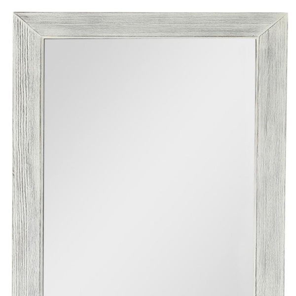 HomeRoots Brown Freestanding Ornate Accent Mirror with Carved Frame - Elevate Your Space with Style! 708715