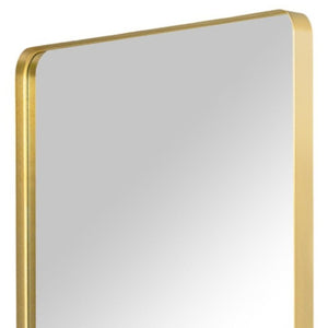 HomeRoots Gold Aluminum Freestanding Accent Mirror with Ornate Frame - Elevate Your Space in Style! 708718