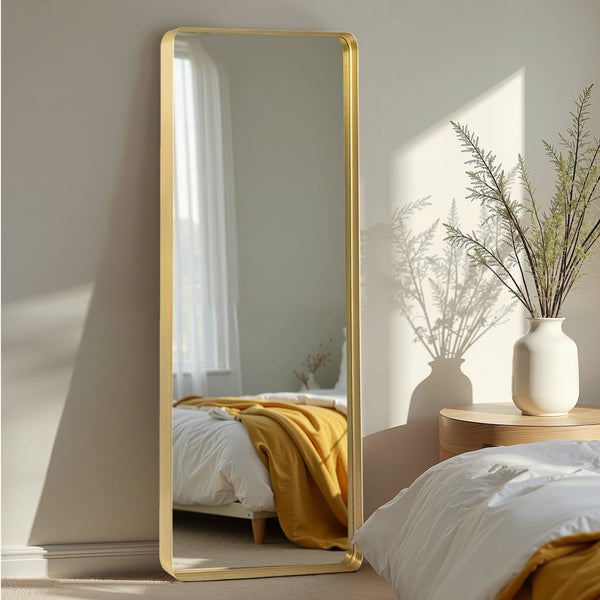 HomeRoots Gold Aluminum Freestanding Accent Mirror with Ornate Frame - Elevate Your Space in Style! 708718
