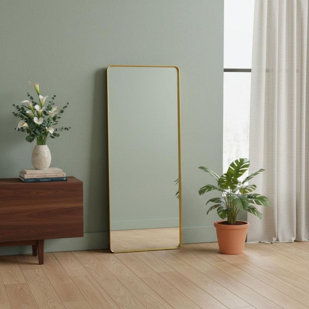 HomeRoots Gold Aluminum Freestanding Accent Mirror with Ornate Frame - Elevate Your Space in Style! 708718