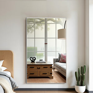 HomeRoots Silver Freestanding Ornate Framed Accent Mirror - Elegant Aluminum Design for Any Room Decor 708724