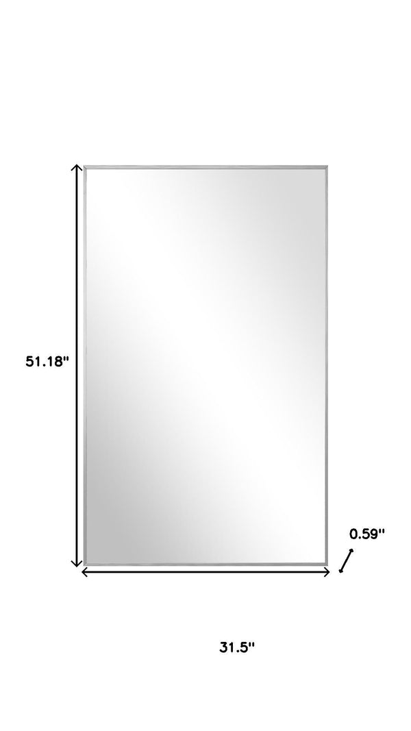 HomeRoots Silver Freestanding Ornate Framed Accent Mirror - Elegant Aluminum Design for Any Room Decor 708724