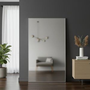 HomeRoots Silver Freestanding Ornate Framed Accent Mirror - Elegant Aluminum Design for Any Room Decor 708724