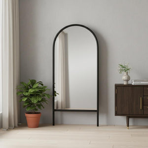 HomeRoots Black Arched Freestanding Accent Mirror with Ornate Frame - Elevate Your Space with Style and Charm 708734
