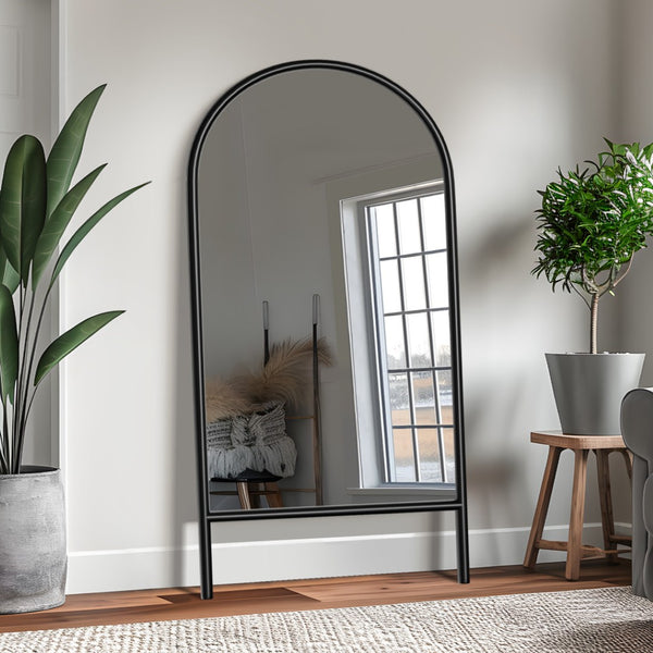 HomeRoots Black Arched Freestanding Accent Mirror with Ornate Frame - Elevate Your Space with Style and Charm 708734