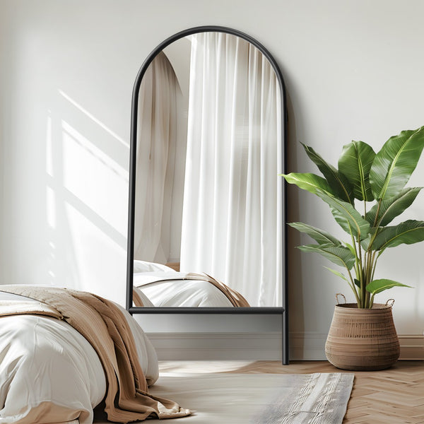 HomeRoots Black Arched Freestanding Accent Mirror with Ornate Frame - Elevate Your Space with Style and Charm 708734