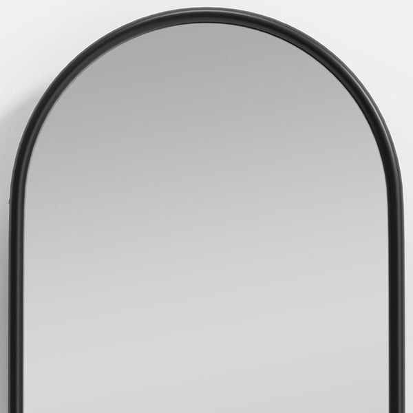 HomeRoots Black Arched Freestanding Accent Mirror with Ornate Frame - Elevate Your Space with Style and Charm 708734