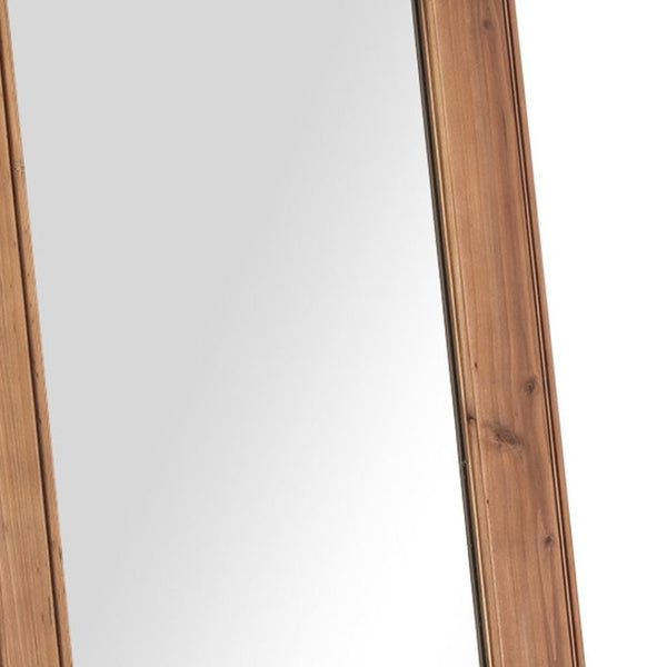 HomeRoots Gold Freestanding Ornate Framed Accent Mirror - Elegantly Brighten Any Space with Full-Length Reflection 708744