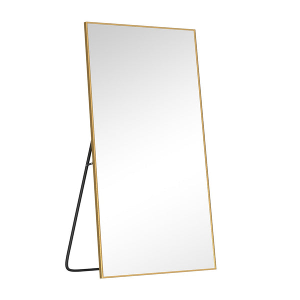HomeRoots Gold Freestanding Arch Mirror with Ornate Frame - Modern Metallic Accent for Elegant Interiors 708749