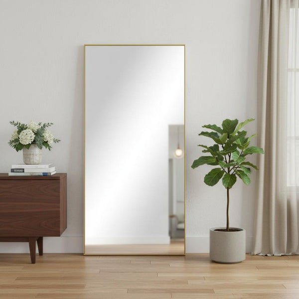 HomeRoots Gold Freestanding Arch Mirror with Ornate Frame - Modern Metallic Accent for Elegant Interiors 708749