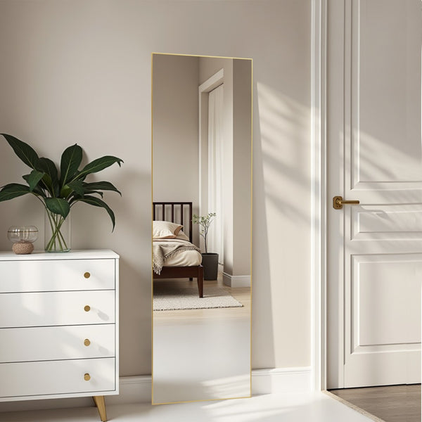 HomeRoots Gold Freestanding Ornate Accent Mirror - Elegant Aluminum Frame for Bedrooms, Entryways & More 708759