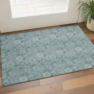 HomeRoots 5' X 8' Teal And Aqua Floral Area Rug - Washable, UV Protected, Stain Resistant for Stylish Durability 708810