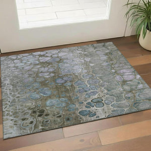 HomeRoots 5' X 8' Washable Abstract Area Rug in Brown, Blue & Gray with UV Protection for High-Traffic Spaces 708834