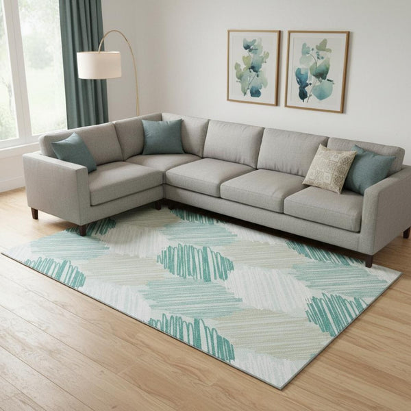 HomeRoots 10' X 14' Teal, Ivory & Gray Geometric Area Rug - Washable, UV-Protected for Modern Living Spaces 708904