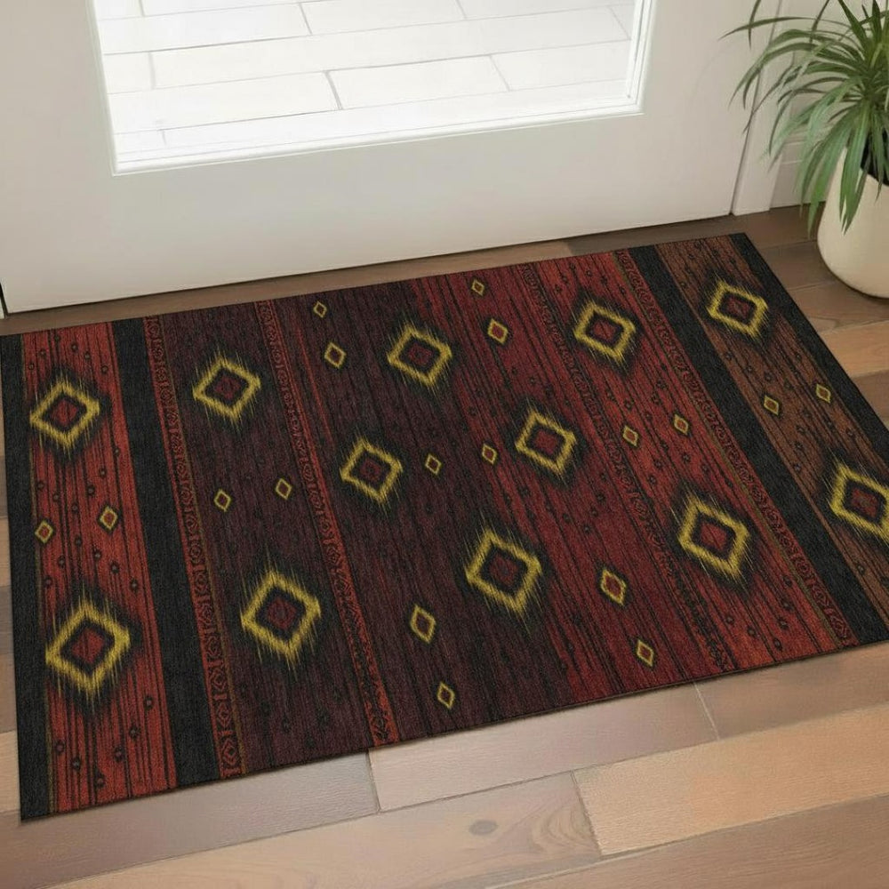 HomeRoots 5' X 8' Tribal Washable Area Rug in Red, Black & Gold – UV Protected, Stain Resistant & Non-Slip! 708918