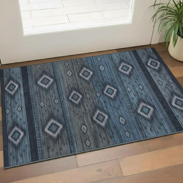 HomeRoots 5' X 8' Teal and Gray Tribal Washable Area Rug - Durable, UV-Protected, Perfect for Busy Homes! 708924