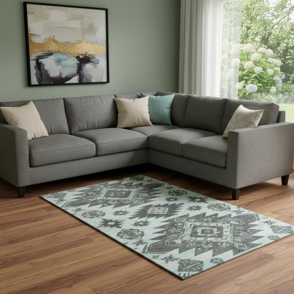 HomeRoots 9' X 12' Stylish Mint Green Tribal Area Rug - Washable, UV-Protected & Durable for Homes with Pets 709005