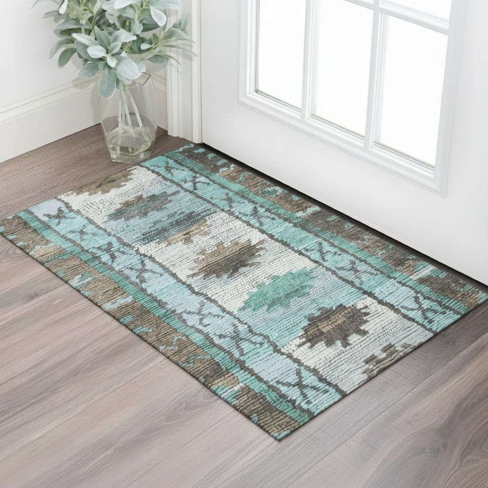 HomeRoots 5' X 8' Tribal Area Rug in Brown, Teal & Ivory – Washable, Stain Resistant & UV Protected for Homes 709020